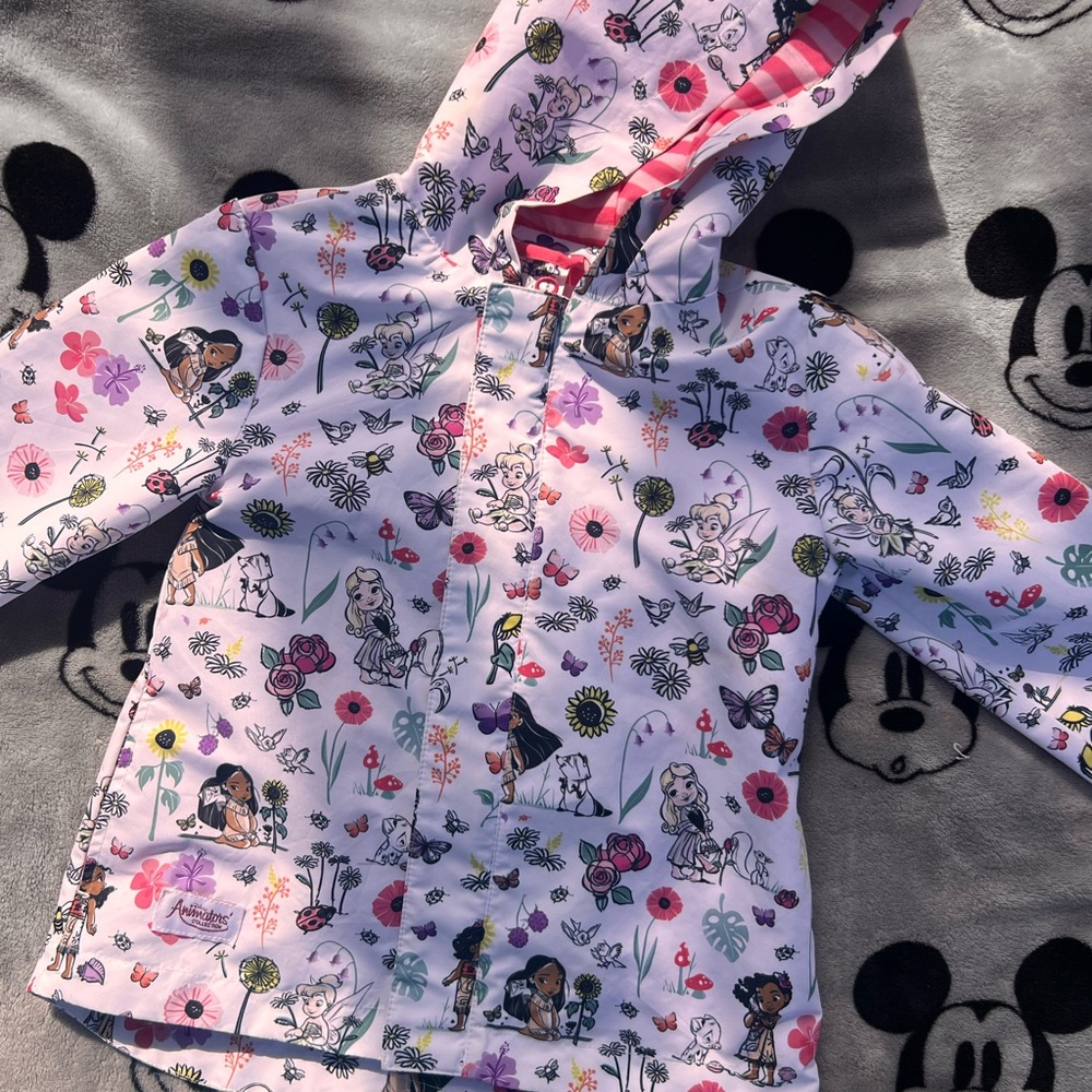Disney rain jacket! 🤍💜